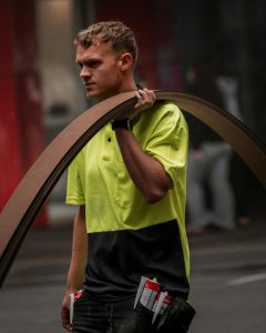 A person at work in a trade job.